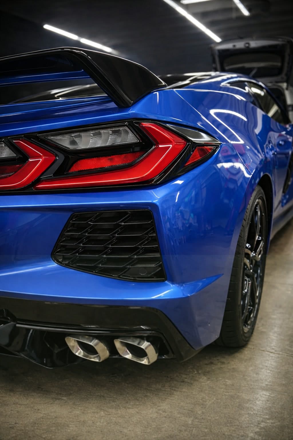 Ceramic coating on blue Corvette — deep gloss and long-term paint protection on Oahu