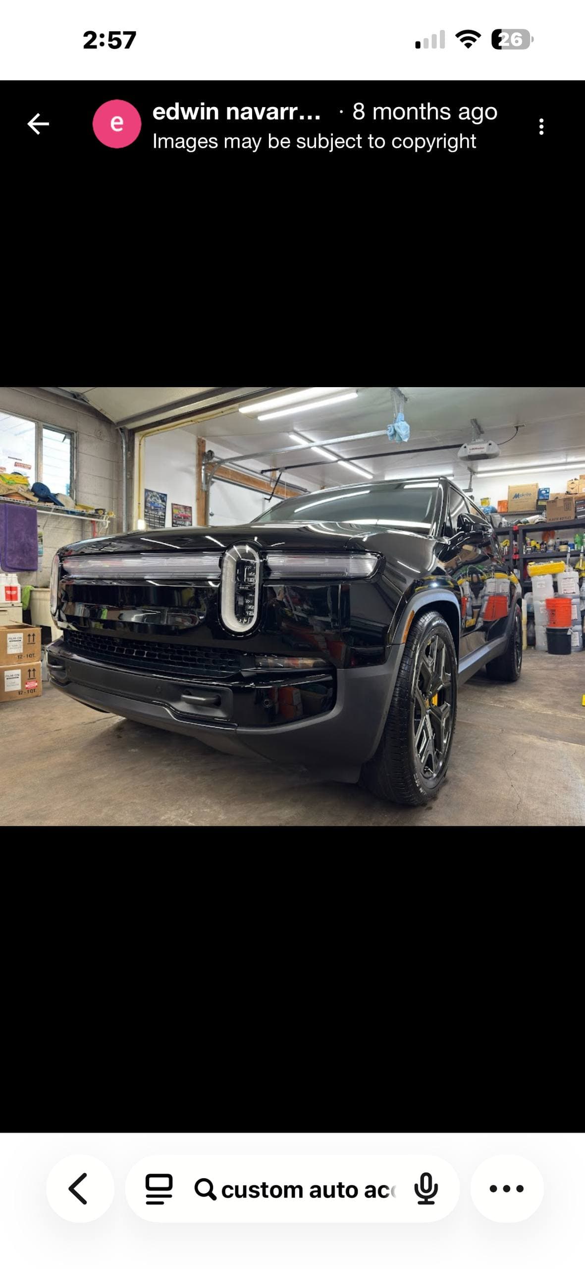 Black Rivian R1T after ceramic coating at Custom Auto Accessories